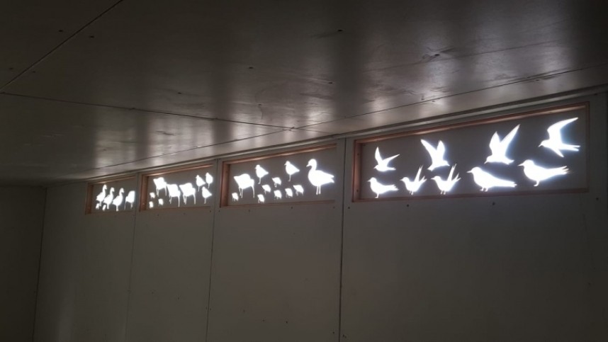  A unique feature of GFB hides, beautiful bird stencil windows shining just the right amount of light into the hides © John Beaumont